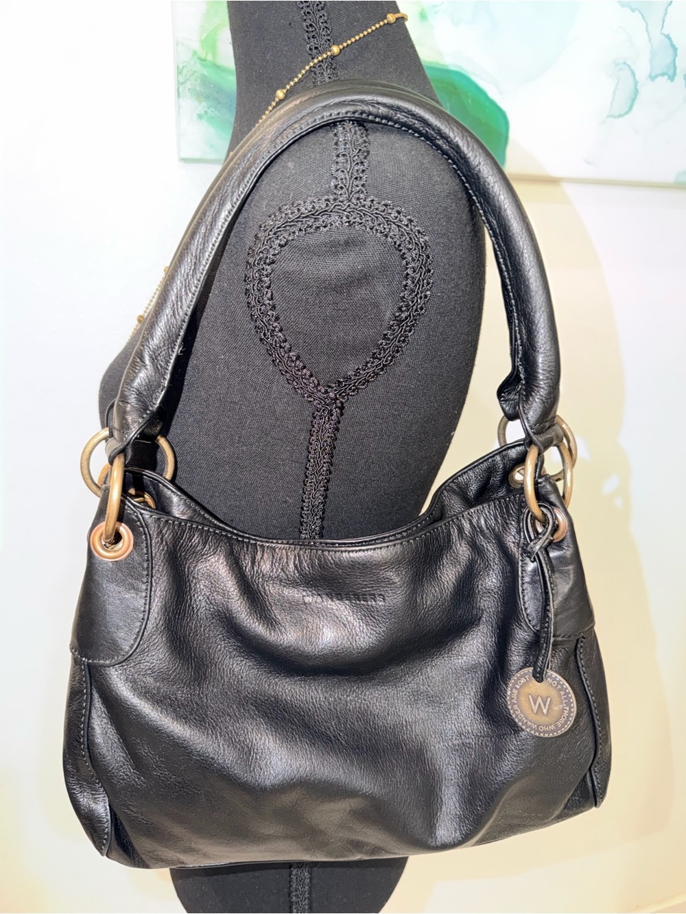 Black Leather Shoulder Bag with Brass Ring Accent